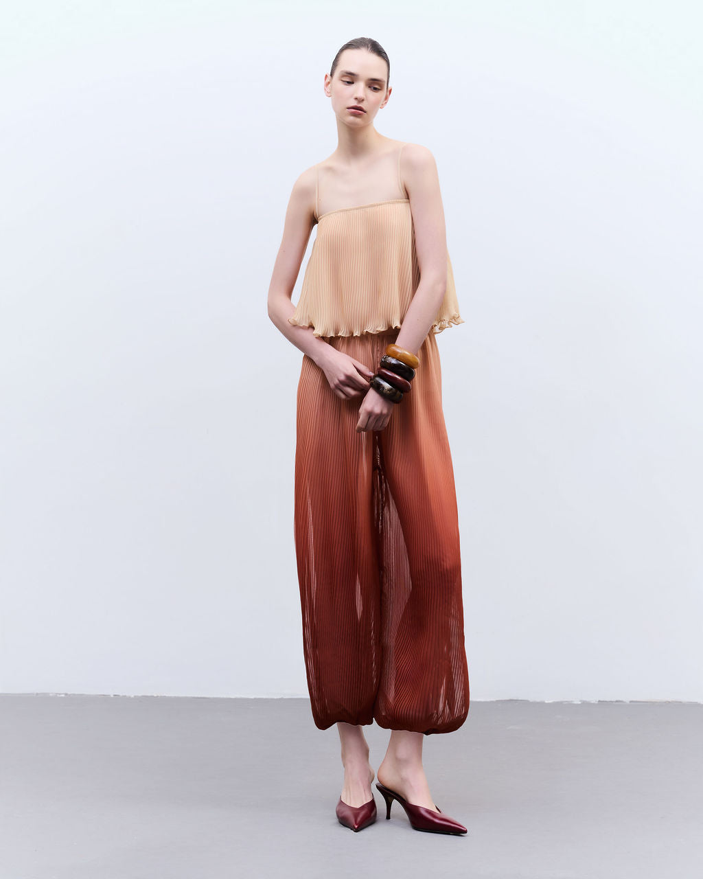 calça pleats degradê terra
