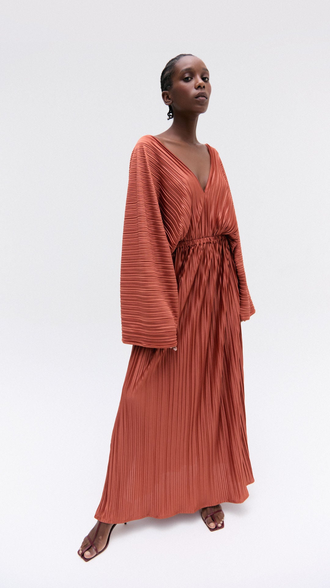 pleated dress with terracotta sleeves